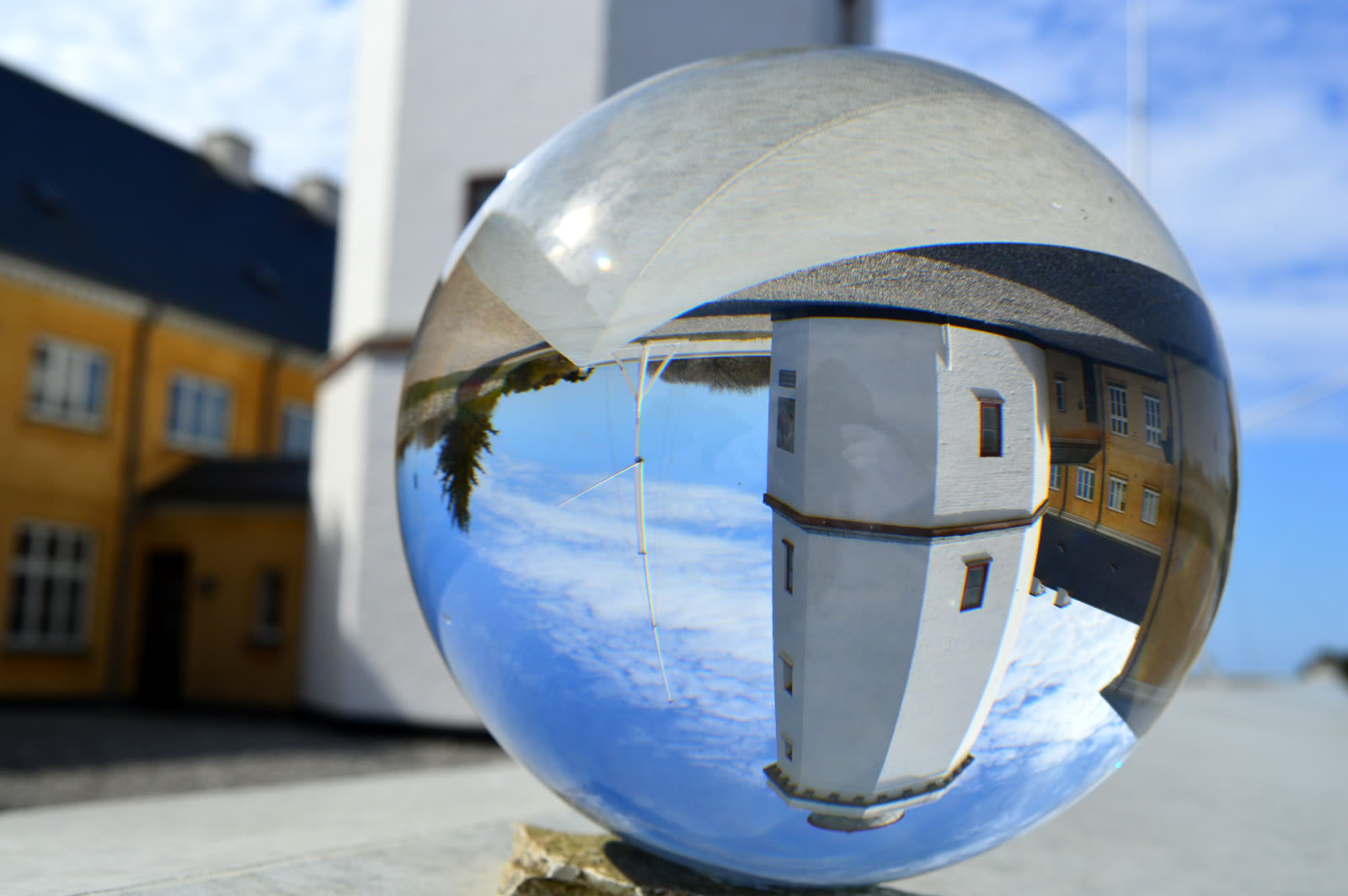 A landscape refracted to an inverted focus through a crystal ball